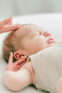 Mother is sleep training newborn